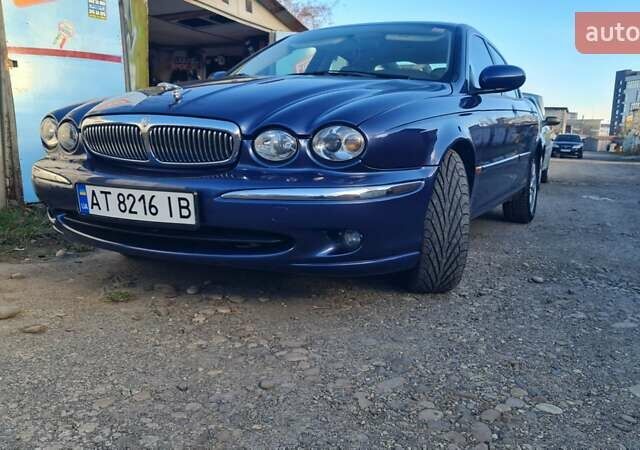 Синий Ягуар Х-Тайп, объемом двигателя 3 л и пробегом 156 тыс. км за 6000 $, фото 1 на Automoto.ua