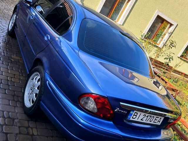 Синий Ягуар Х-Тайп, объемом двигателя 2 л и пробегом 222 тыс. км за 5200 $, фото 5 на Automoto.ua