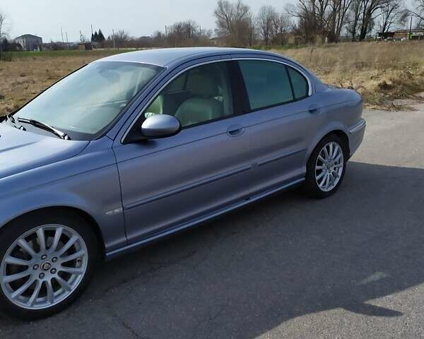 Синий Ягуар Х-Тайп, объемом двигателя 2.5 л и пробегом 220 тыс. км за 5700 $, фото 2 на Automoto.ua