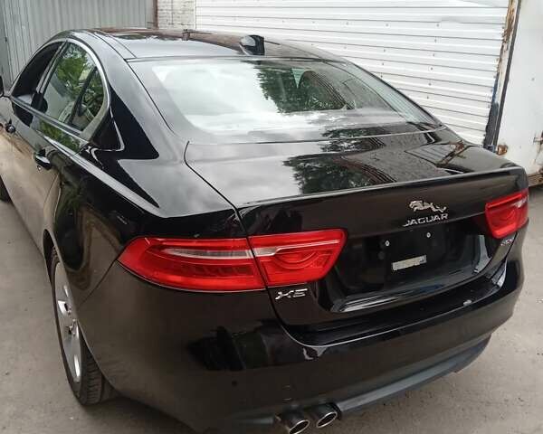 Черный Ягуар XE, объемом двигателя 2 л и пробегом 125 тыс. км за 18000 $, фото 12 на Automoto.ua