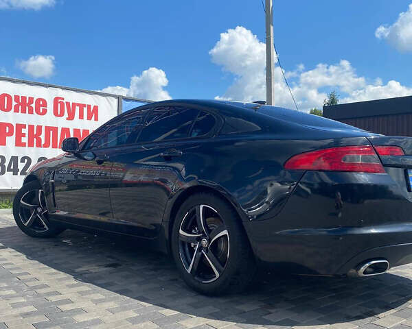 Черный Ягуар ХФ, объемом двигателя 2.97 л и пробегом 230 тыс. км за 9000 $, фото 1 на Automoto.ua