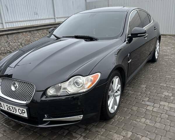 Черный Ягуар ХФ, объемом двигателя 2.99 л и пробегом 177 тыс. км за 12700 $, фото 5 на Automoto.ua