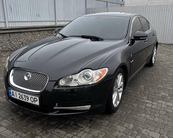 Черный Ягуар ХФ, объемом двигателя 2.99 л и пробегом 177 тыс. км за 12700 $, фото 1 на Automoto.ua