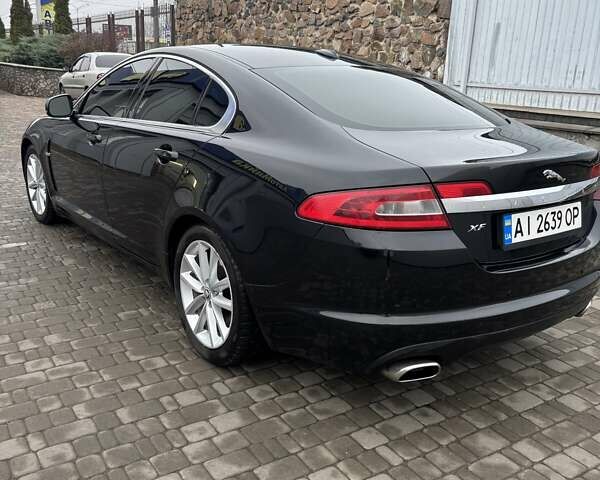 Черный Ягуар ХФ, объемом двигателя 2.99 л и пробегом 177 тыс. км за 12700 $, фото 3 на Automoto.ua