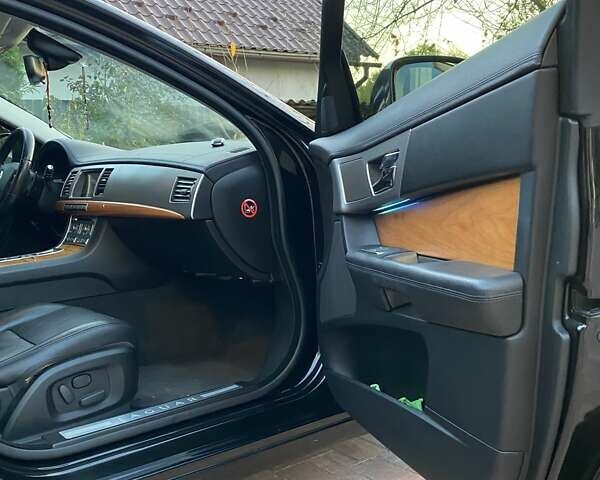 Черный Ягуар ХФ, объемом двигателя 2.99 л и пробегом 192 тыс. км за 10500 $, фото 29 на Automoto.ua