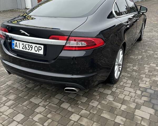 Черный Ягуар ХФ, объемом двигателя 2.99 л и пробегом 177 тыс. км за 12700 $, фото 2 на Automoto.ua