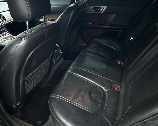 Черный Ягуар ХФ, объемом двигателя 2.97 л и пробегом 282 тыс. км за 9500 $, фото 12 на Automoto.ua