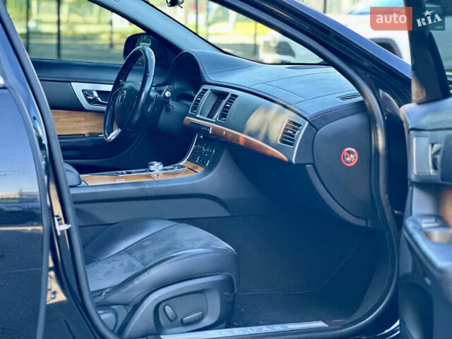 Черный Ягуар ХФ, объемом двигателя 2.97 л и пробегом 202 тыс. км за 9700 $, фото 20 на Automoto.ua