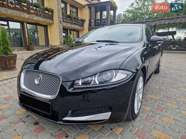 Черный Ягуар ХФ, объемом двигателя 2.2 л и пробегом 269 тыс. км за 14800 $, фото 5 на Automoto.ua