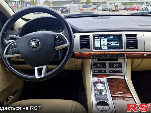 Черный Ягуар ХФ, объемом двигателя 2 л и пробегом 129 тыс. км за 16200 $, фото 10 на Automoto.ua