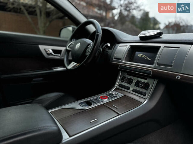 Черный Ягуар ХФ, объемом двигателя 2.18 л и пробегом 147 тыс. км за 10700 $, фото 21 на Automoto.ua