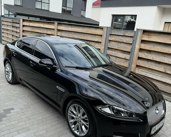 Черный Ягуар ХФ, объемом двигателя 2 л и пробегом 29 тыс. км за 25100 $, фото 1 на Automoto.ua
