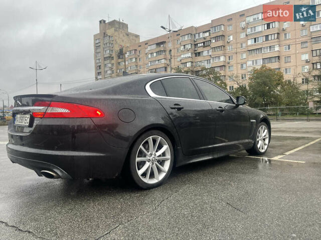 Черный Ягуар ХФ, объемом двигателя 3 л и пробегом 70 тыс. км за 17000 $, фото 4 на Automoto.ua