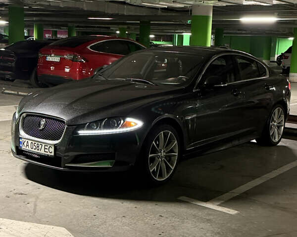 Черный Ягуар ХФ, объемом двигателя 3 л и пробегом 89 тыс. км за 14700 $, фото 1 на Automoto.ua