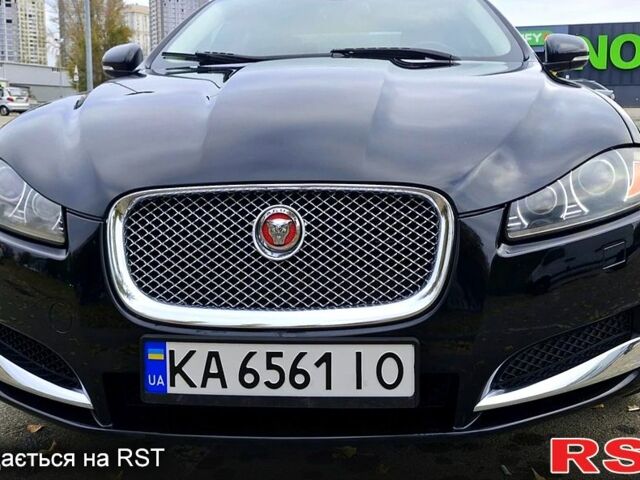 Черный Ягуар ХФ, объемом двигателя 2 л и пробегом 129 тыс. км за 16200 $, фото 3 на Automoto.ua