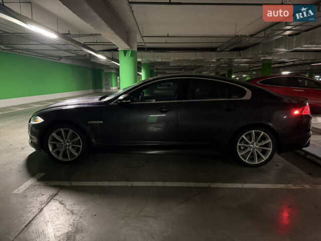 Черный Ягуар ХФ, объемом двигателя 3 л и пробегом 89 тыс. км за 14700 $, фото 2 на Automoto.ua