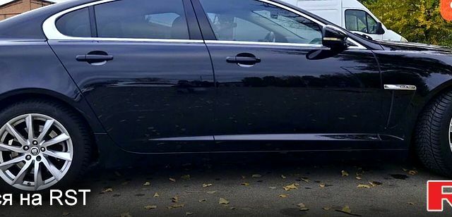 Черный Ягуар ХФ, объемом двигателя 2 л и пробегом 129 тыс. км за 16200 $, фото 5 на Automoto.ua