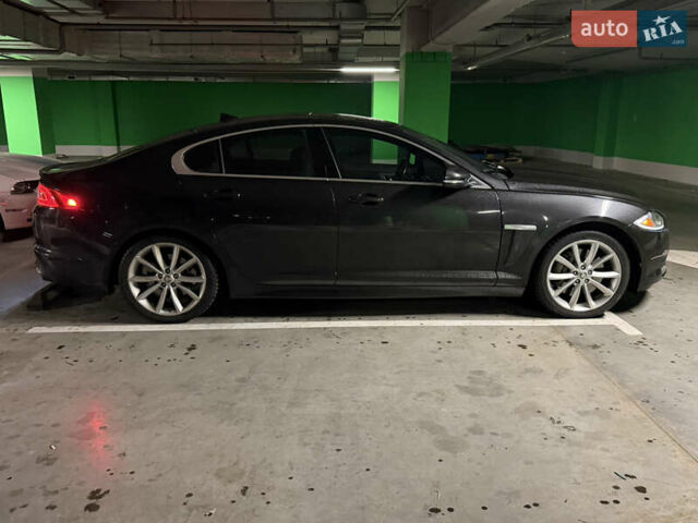 Черный Ягуар ХФ, объемом двигателя 3 л и пробегом 89 тыс. км за 14700 $, фото 5 на Automoto.ua