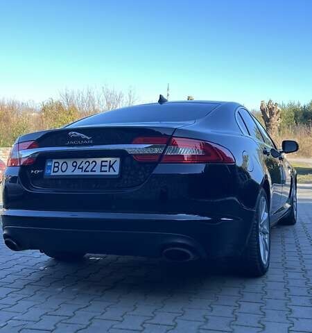 Черный Ягуар ХФ, объемом двигателя 2 л и пробегом 215 тыс. км за 12800 $, фото 1 на Automoto.ua