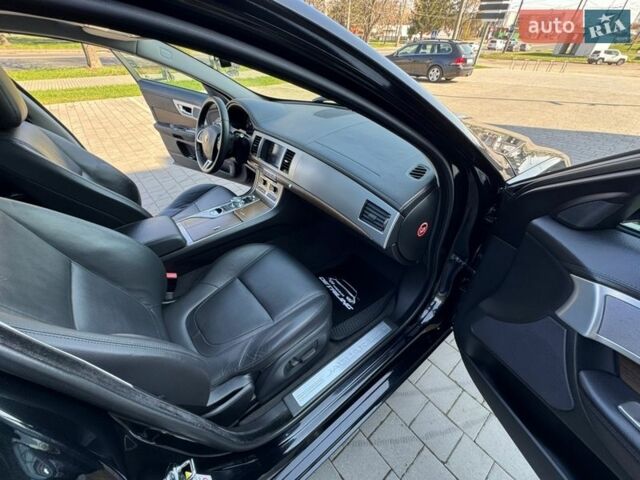 Чорний Ягуар ХФ, об'ємом двигуна 2 л та пробігом 218 тис. км за 9900 $, фото 48 на Automoto.ua