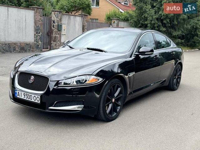 Черный Ягуар ХФ, объемом двигателя 3 л и пробегом 130 тыс. км за 16900 $, фото 4 на Automoto.ua