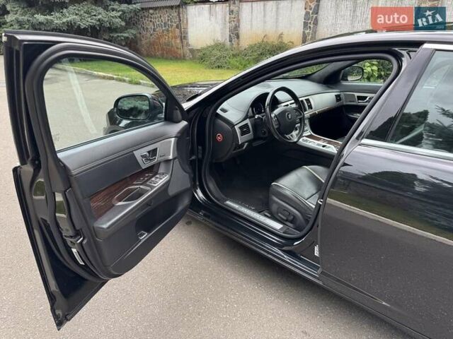 Черный Ягуар ХФ, объемом двигателя 3 л и пробегом 130 тыс. км за 16900 $, фото 14 на Automoto.ua