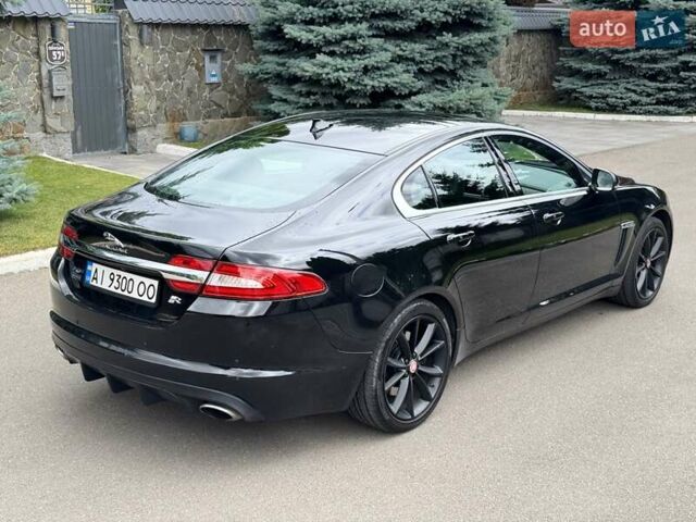 Черный Ягуар ХФ, объемом двигателя 3 л и пробегом 130 тыс. км за 16900 $, фото 3 на Automoto.ua