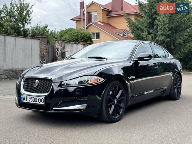 Черный Ягуар ХФ, объемом двигателя 3 л и пробегом 130 тыс. км за 16900 $, фото 1 на Automoto.ua