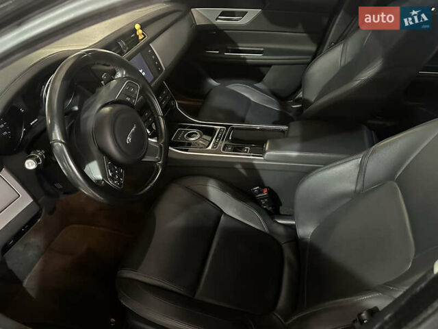 Чорний Ягуар ХФ, об'ємом двигуна 2 л та пробігом 56 тис. км за 16999 $, фото 7 на Automoto.ua