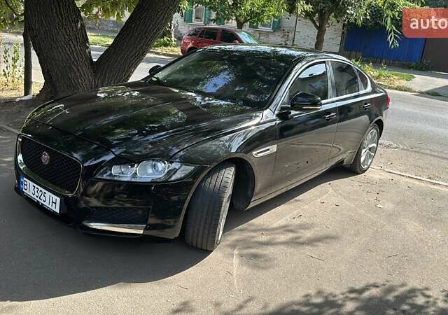 Черный Ягуар ХФ, объемом двигателя 2 л и пробегом 65 тыс. км за 17200 $, фото 1 на Automoto.ua