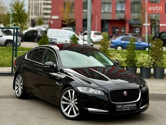 Черный Ягуар ХФ, объемом двигателя 2 л и пробегом 99 тыс. км за 22900 $, фото 1 на Automoto.ua