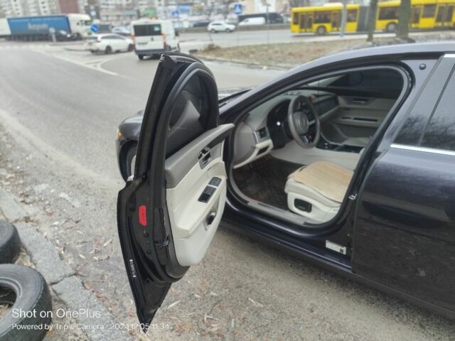 Черный Ягуар ХФ, объемом двигателя 2 л и пробегом 141 тыс. км за 17324 $, фото 4 на Automoto.ua