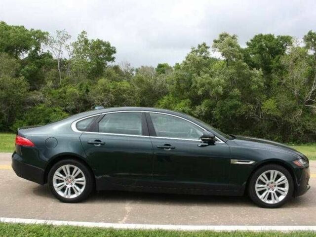 Черный Ягуар ХФ, объемом двигателя 3 л и пробегом 66 тыс. км за 3700 $, фото 4 на Automoto.ua