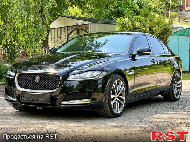 Черный Ягуар ХФ, объемом двигателя 2 л и пробегом 125 тыс. км за 17400 $, фото 3 на Automoto.ua