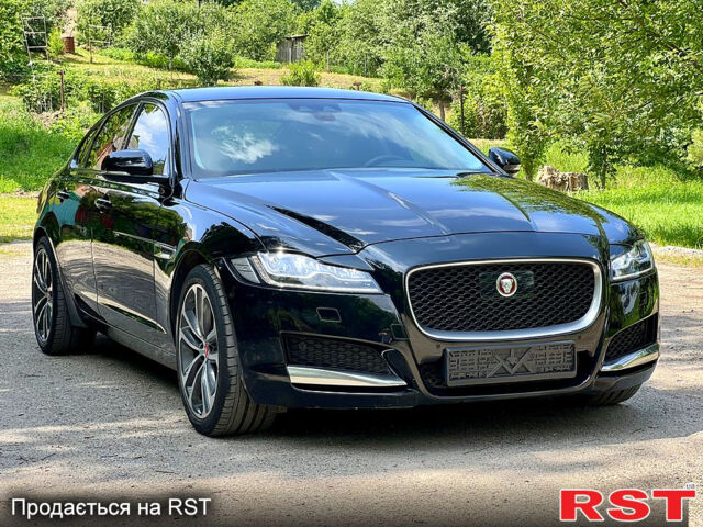 Черный Ягуар ХФ, объемом двигателя 2 л и пробегом 125 тыс. км за 17400 $, фото 1 на Automoto.ua
