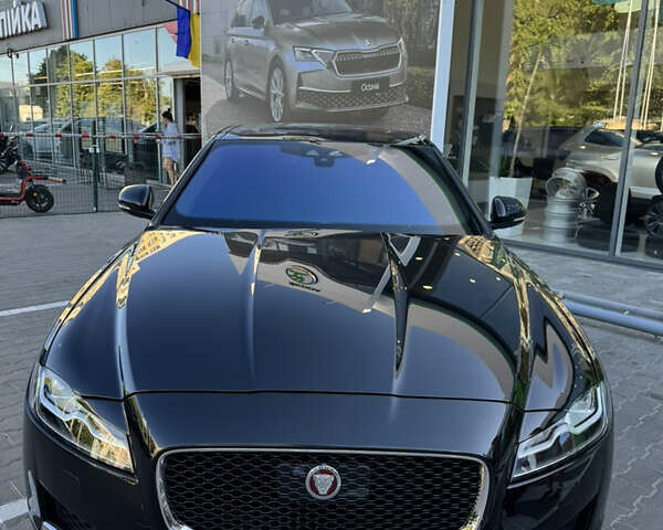 Черный Ягуар ХФ, объемом двигателя 2 л и пробегом 100 тыс. км за 26000 $, фото 3 на Automoto.ua