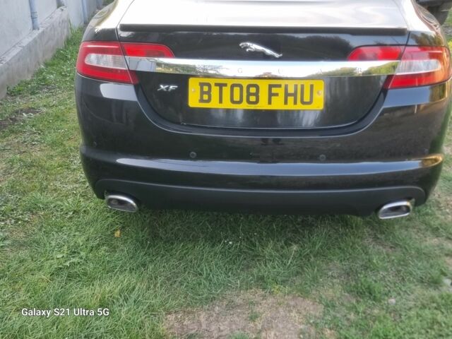 Черный Ягуар ХФ, объемом двигателя 3 л и пробегом 170 тыс. км за 38000 $, фото 1 на Automoto.ua