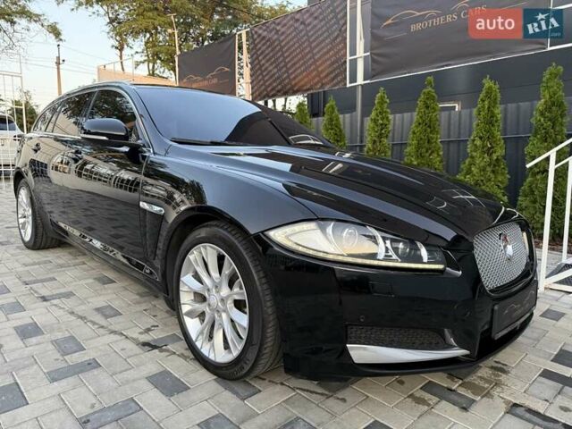 Черный Ягуар ХФ, объемом двигателя 2.18 л и пробегом 286 тыс. км за 12800 $, фото 6 на Automoto.ua