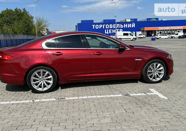 Красный Ягуар ХФ, объемом двигателя 2 л и пробегом 153 тыс. км за 10550 $, фото 3 на Automoto.ua
