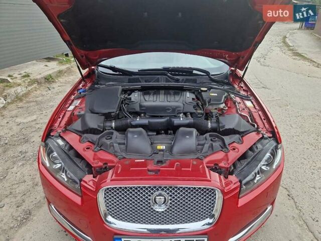 Червоний Ягуар ХФ, об'ємом двигуна 3 л та пробігом 157 тис. км за 18500 $, фото 5 на Automoto.ua