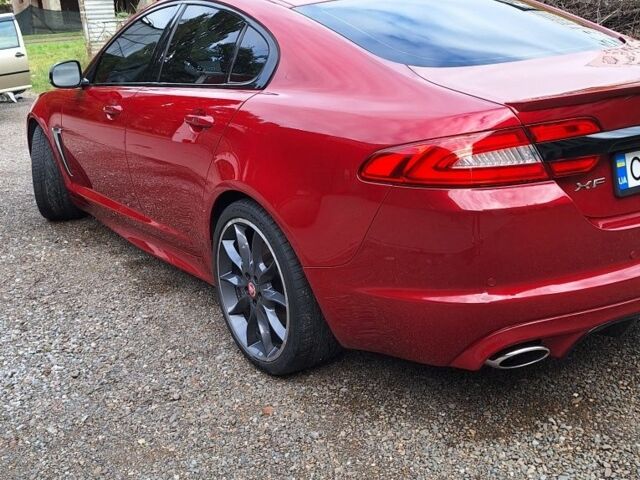 Красный Ягуар ХФ, объемом двигателя 3 л и пробегом 150 тыс. км за 15196 $, фото 6 на Automoto.ua