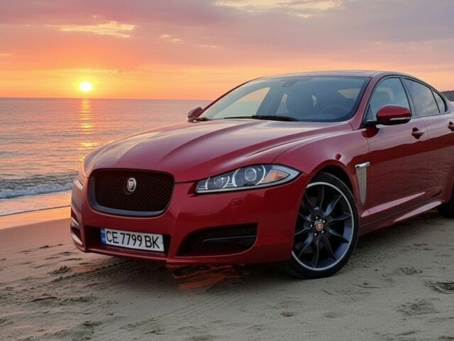 Красный Ягуар ХФ, объемом двигателя 3 л и пробегом 150 тыс. км за 15196 $, фото 1 на Automoto.ua