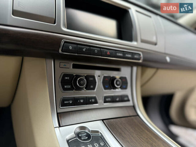 Синій Ягуар ХФ, об'ємом двигуна 2 л та пробігом 91 тис. км за 15500 $, фото 33 на Automoto.ua