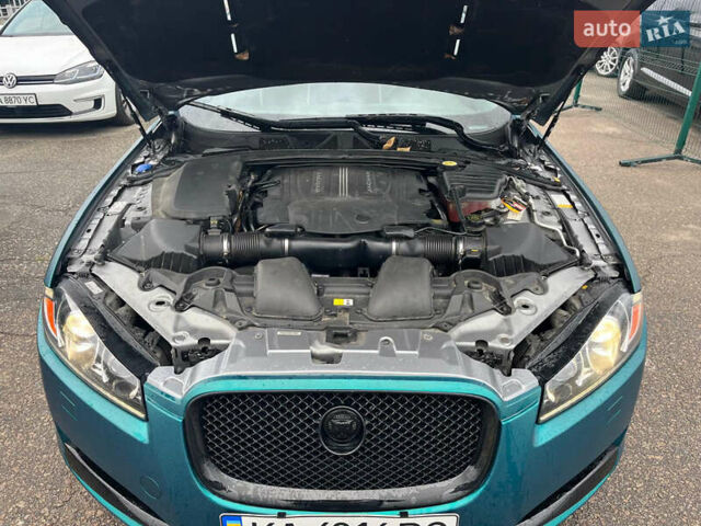 Зелений Ягуар ХФ, об'ємом двигуна 5 л та пробігом 104 тис. км за 36000 $, фото 12 на Automoto.ua