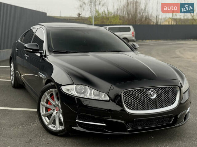 Черный Ягуар Икс Джей, объемом двигателя 5 л и пробегом 125 тыс. км за 20500 $, фото 10 на Automoto.ua