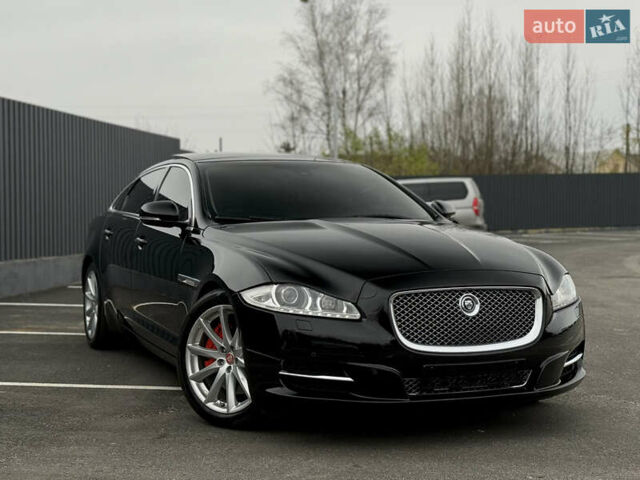 Черный Ягуар Икс Джей, объемом двигателя 5 л и пробегом 125 тыс. км за 20500 $, фото 13 на Automoto.ua
