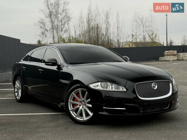Черный Ягуар Икс Джей, объемом двигателя 5 л и пробегом 125 тыс. км за 20500 $, фото 9 на Automoto.ua