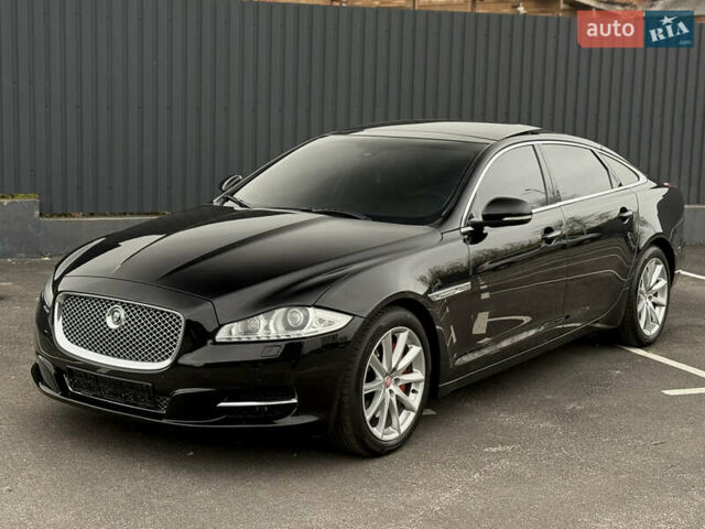 Черный Ягуар Икс Джей, объемом двигателя 5 л и пробегом 125 тыс. км за 20500 $, фото 3 на Automoto.ua