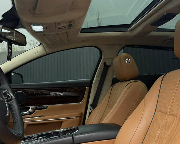 Черный Ягуар Икс Джей, объемом двигателя 5 л и пробегом 125 тыс. км за 20500 $, фото 32 на Automoto.ua