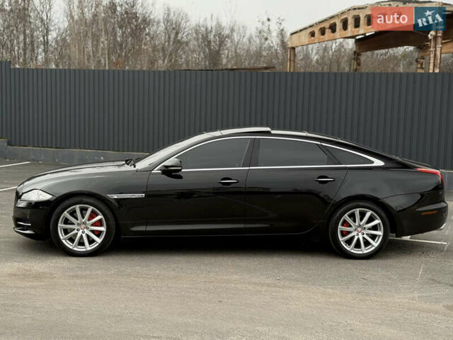 Черный Ягуар Икс Джей, объемом двигателя 5 л и пробегом 125 тыс. км за 20500 $, фото 6 на Automoto.ua